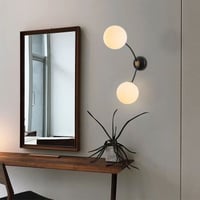Tatum Wandlamp | Metalen behuizing en glazen kap