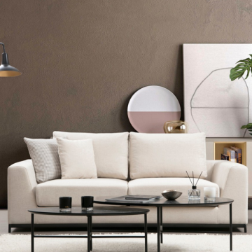Comfortabele 2-zitsbank met beukenhouten frame en beige polyester stof